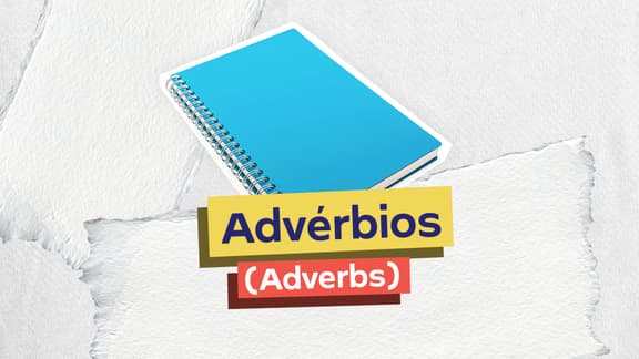 Frase "Advérbios (Adverbs)" centralizada e, logo acima, a imagem de um caderno de estudos.